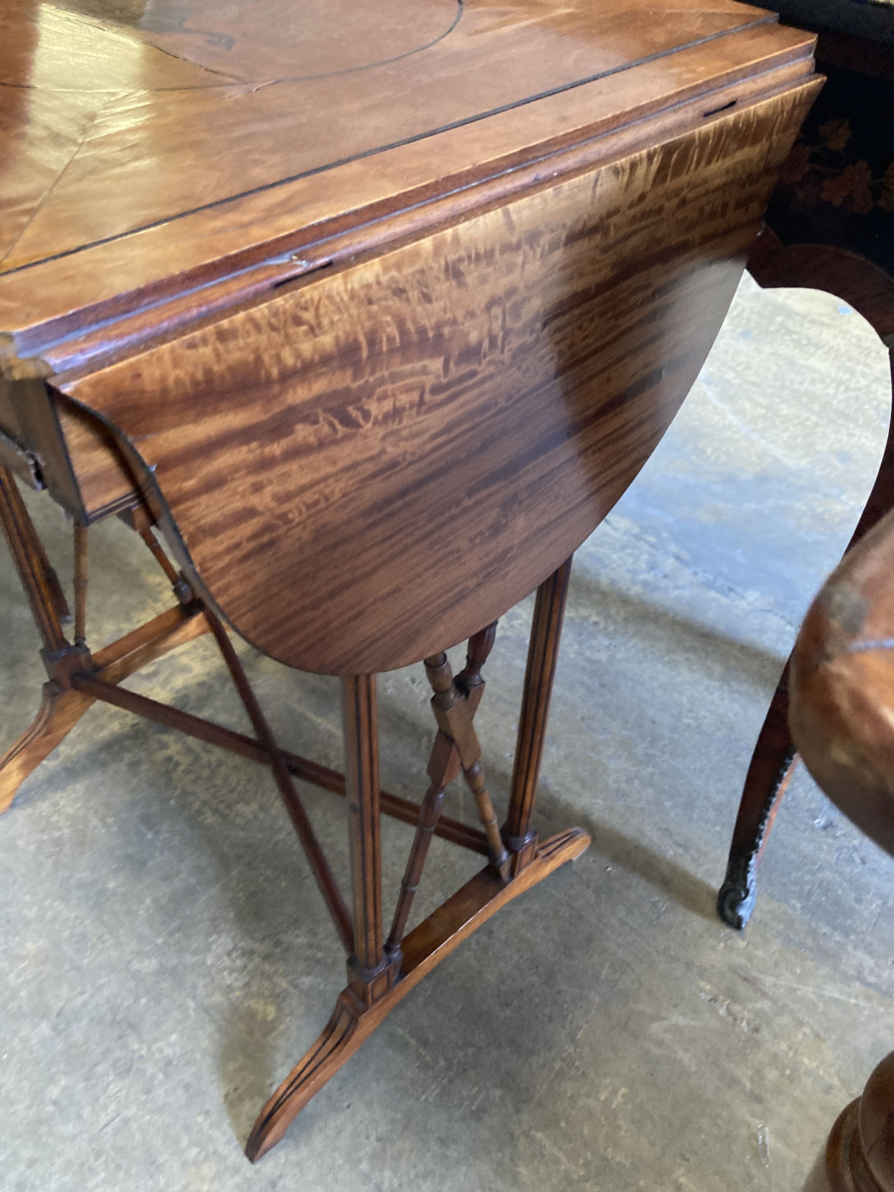 A George III satinwood drop-leaf games table with removable top and slide (modified), width 50cm, depth 41cm, height 71cm